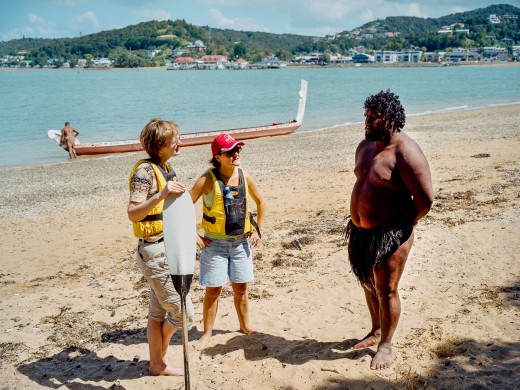 Bay of Islands, Paiha, Maori from the Iwi of the Nagapuhi with European tourists.